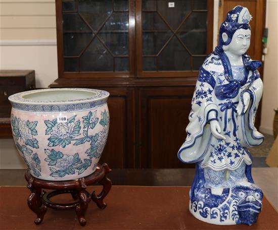 A Chinese fish bowl on stand and figure